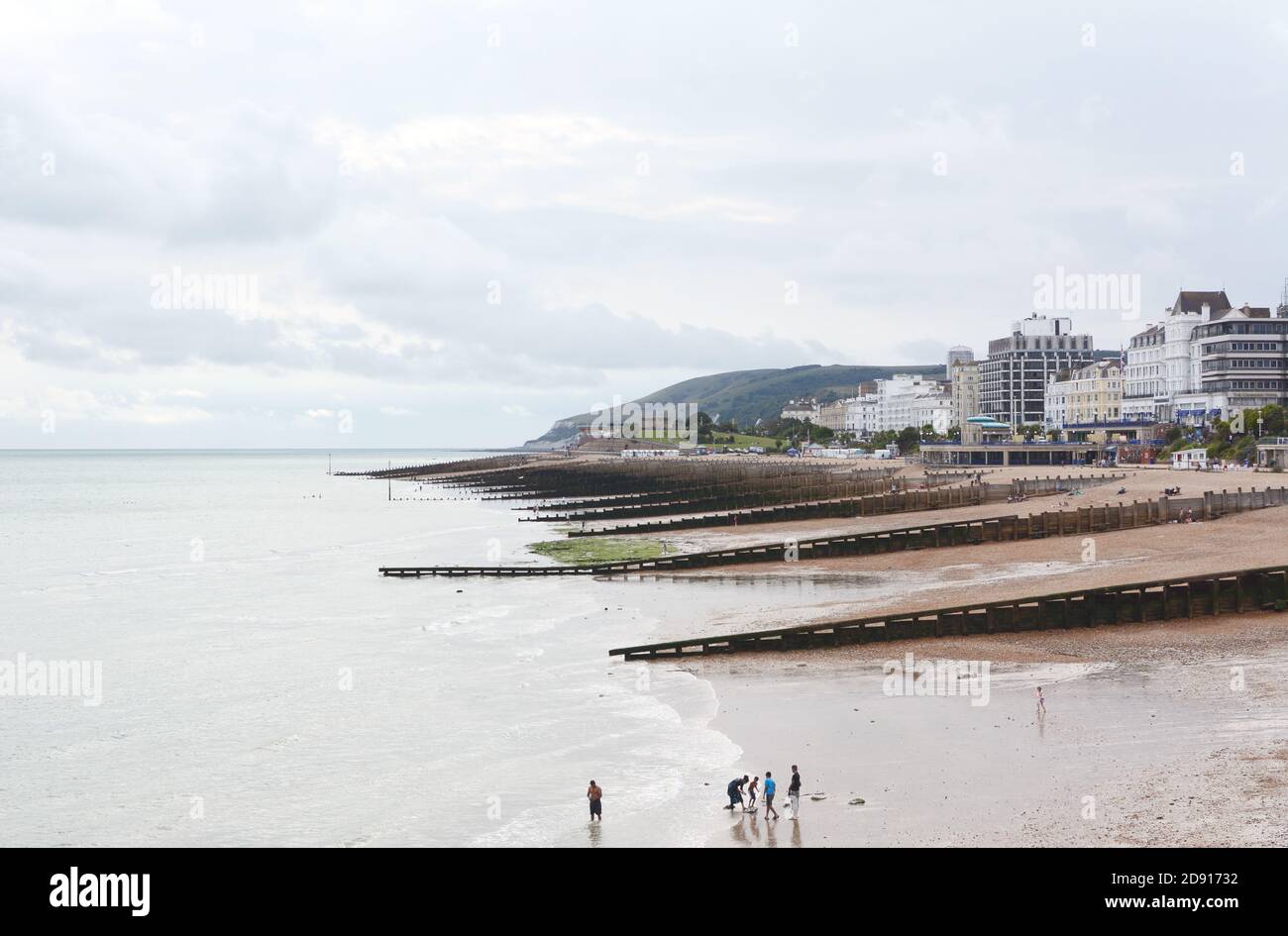 EASTBOURNE, UK - AUGUST 28, 2019: View of Eastbourne beach in East Sussex, from the pier to Redoubt fortress at the end of Royal Parade on August 28, Stock Photo