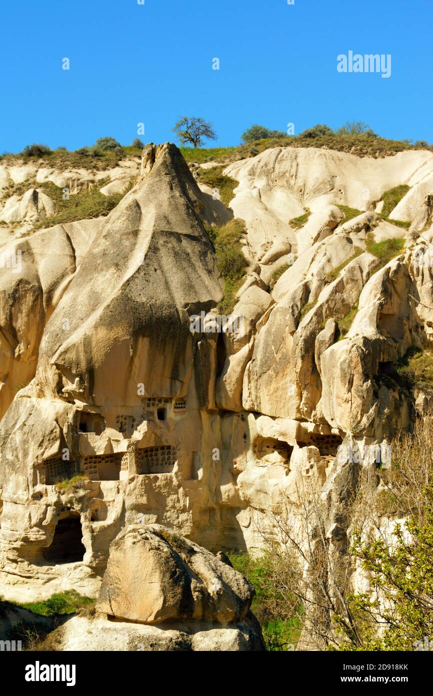 The ancient town of Goreme and its houses and churches carved in the ...