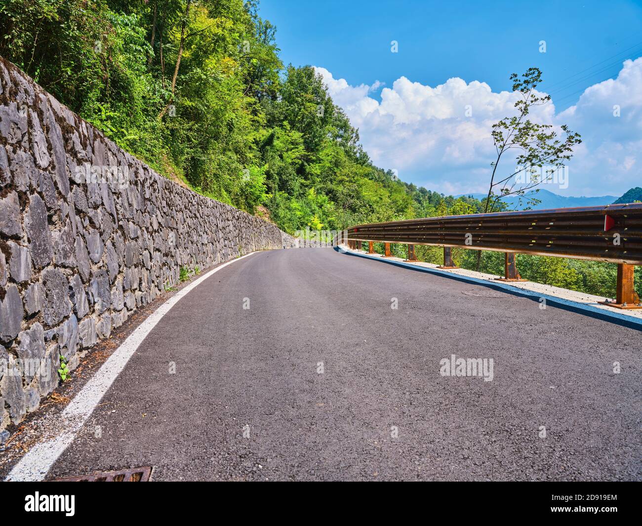 asphalt road in the middle of nature Stock Photo - Alamy