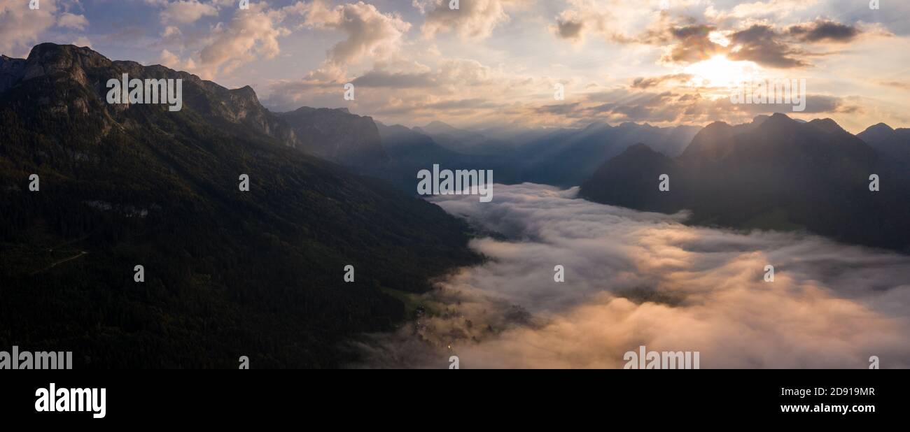 Sunrise above misty Grundlsee with Loser Stock Photo
