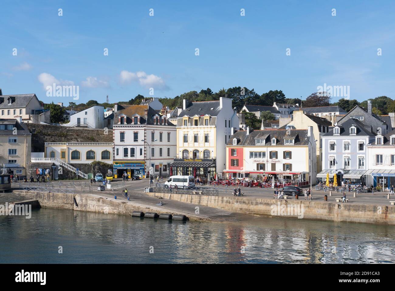 The harbour and waterside at Le Palais, Belle Ile, Brittany, France.  View from the sea. Stock Photo