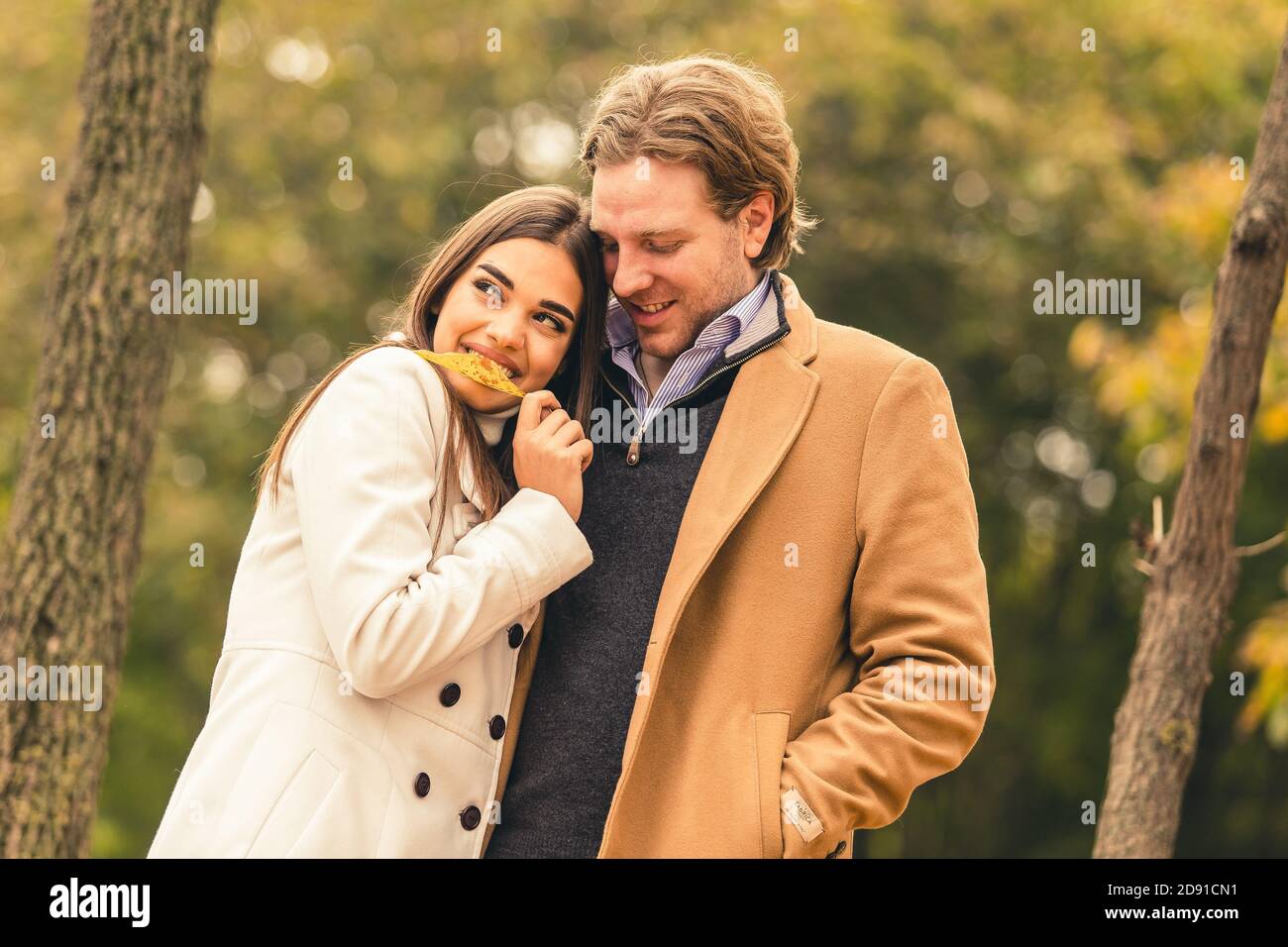 Young couple having fun in park hi-res stock photography and images - Alamy