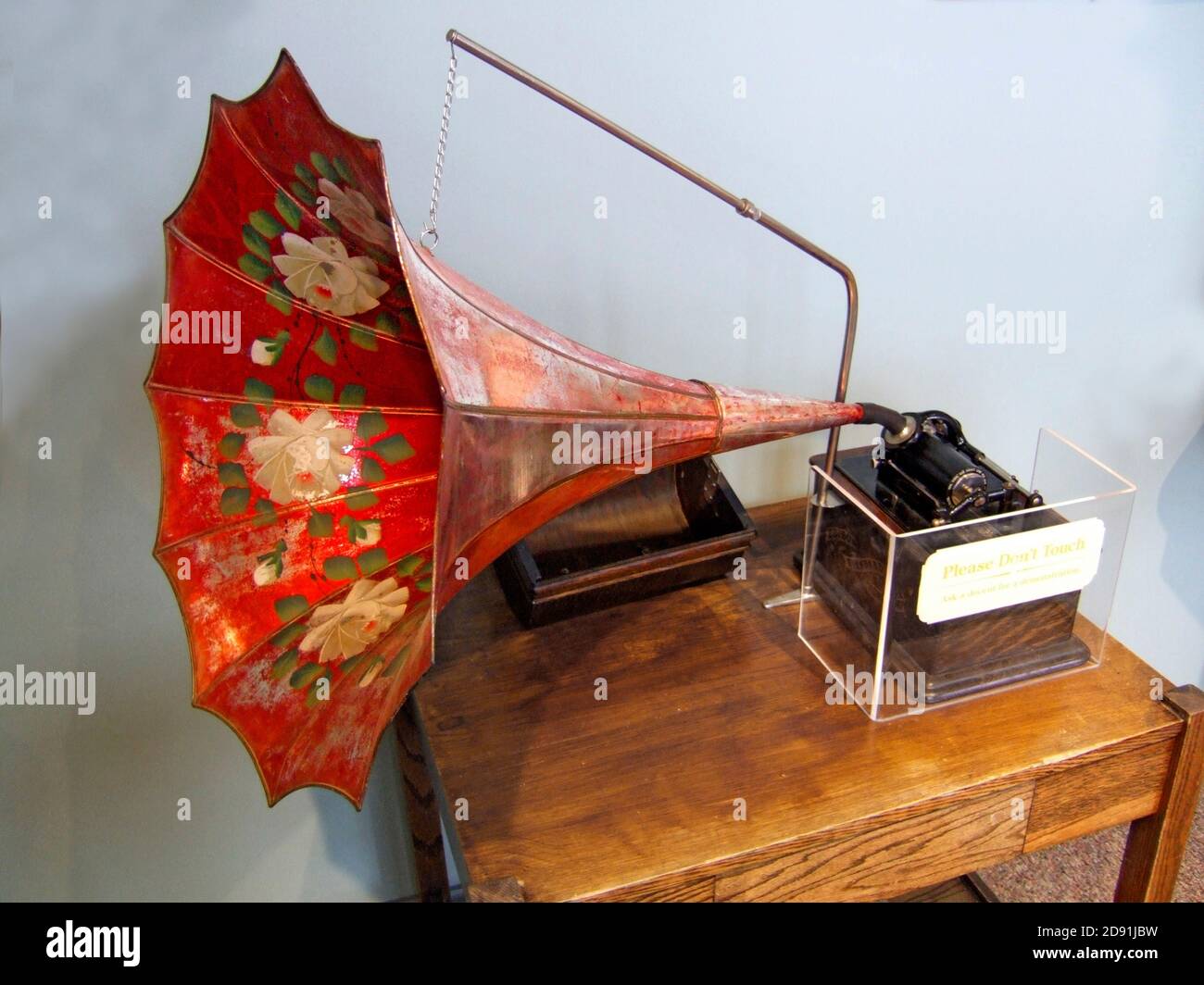 Early phonograph or record player invented by Thomas Elva Edison is on display in a museum in his boyhood town of Port Huron Michigan Stock Photo