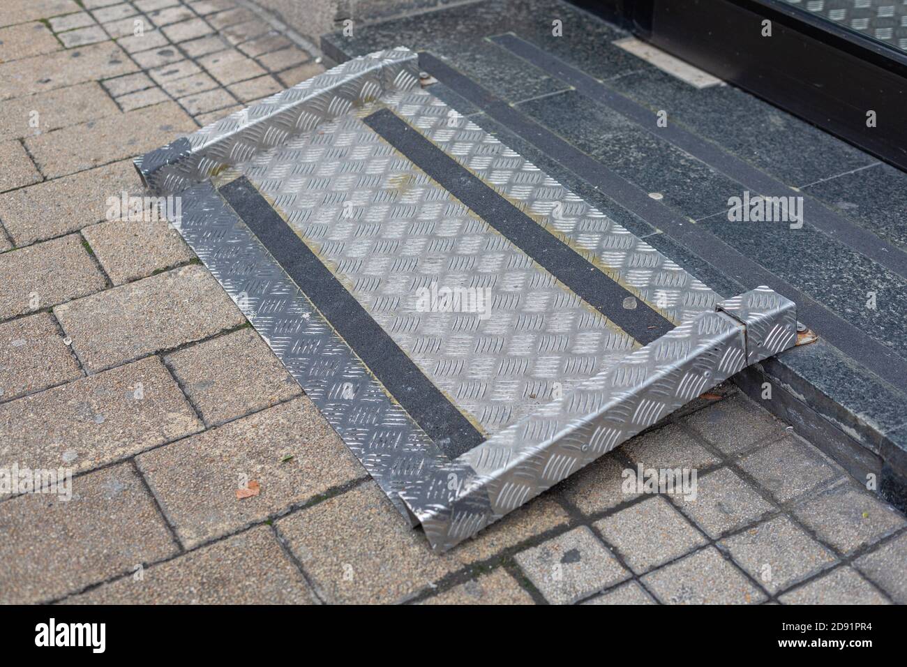 One Step Ramp for Wheelchair User Building Access Stock Photo - Alamy