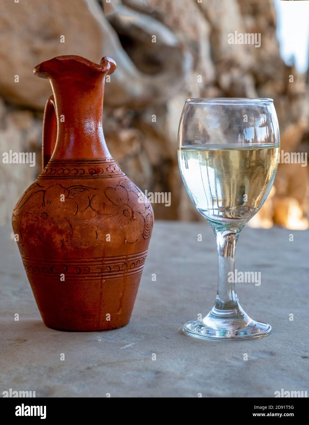 Carafe and glass of  white wine, Last Castle restaurant, Paphos, Cyprus. Stock Photo