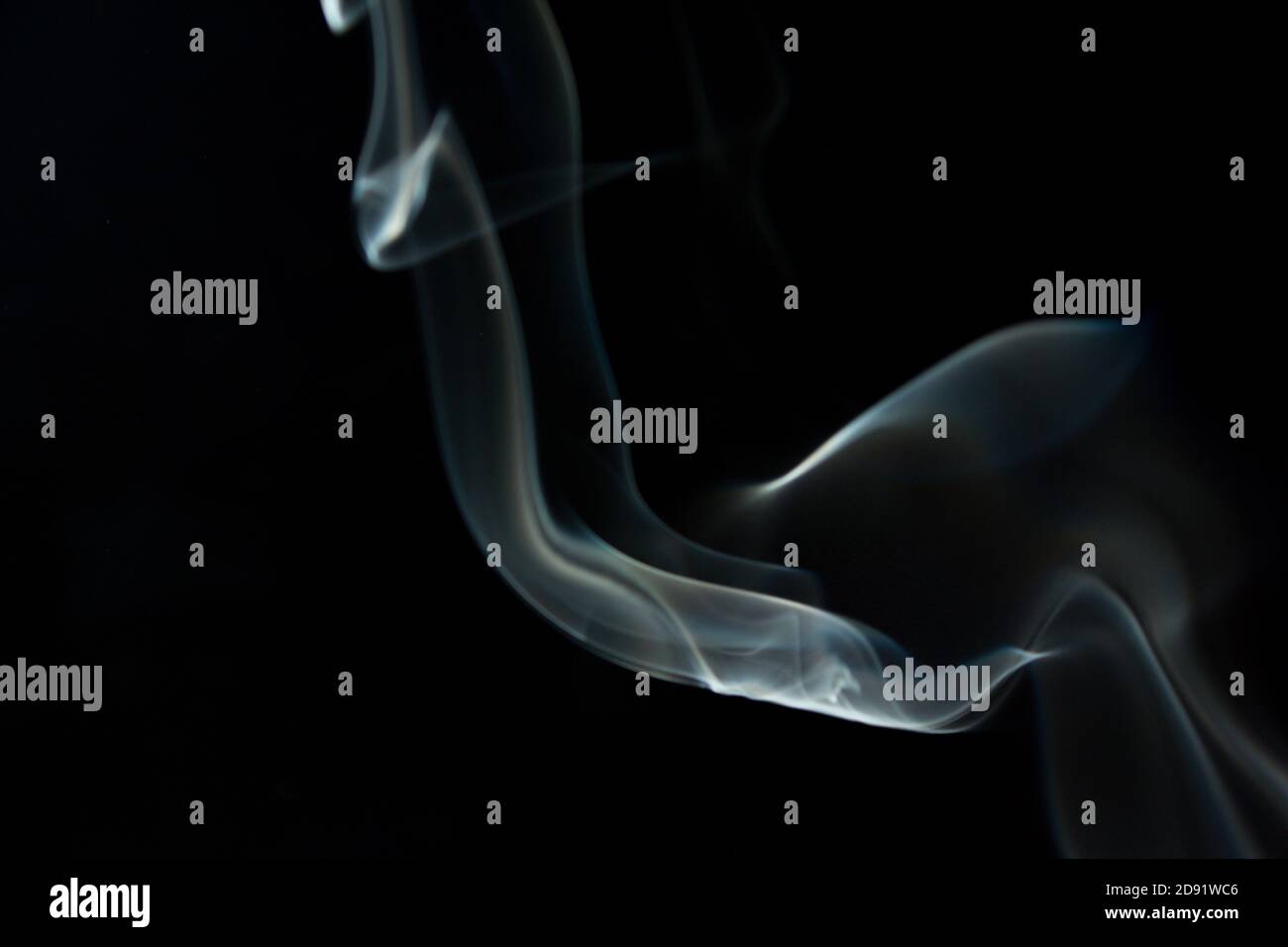 Abstract flowing Blue wispy smoke on dark background Stock Photo