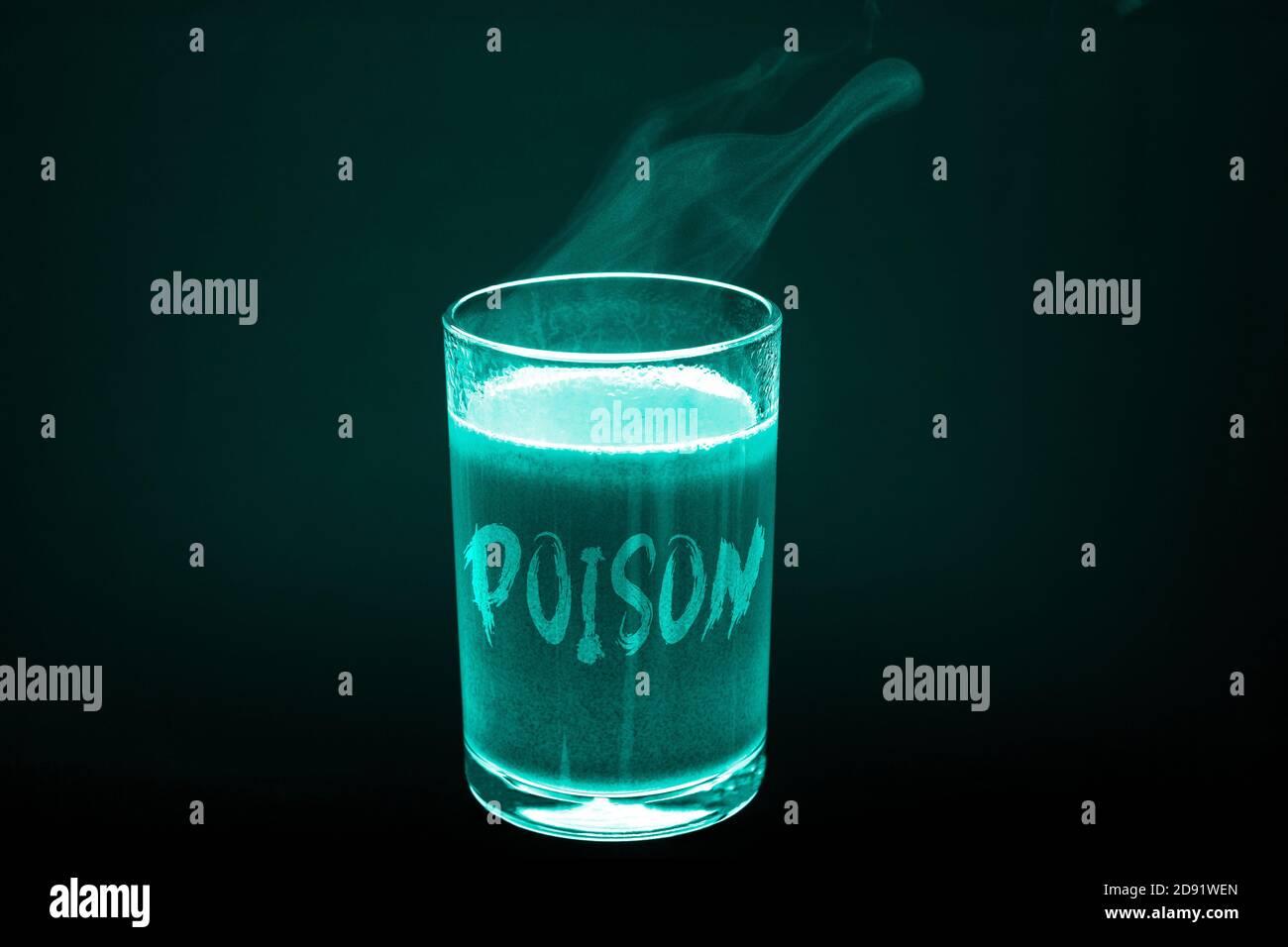 A glass with the inscription poison in x-ray light. A glass of dirty hot liquid Stock Photo