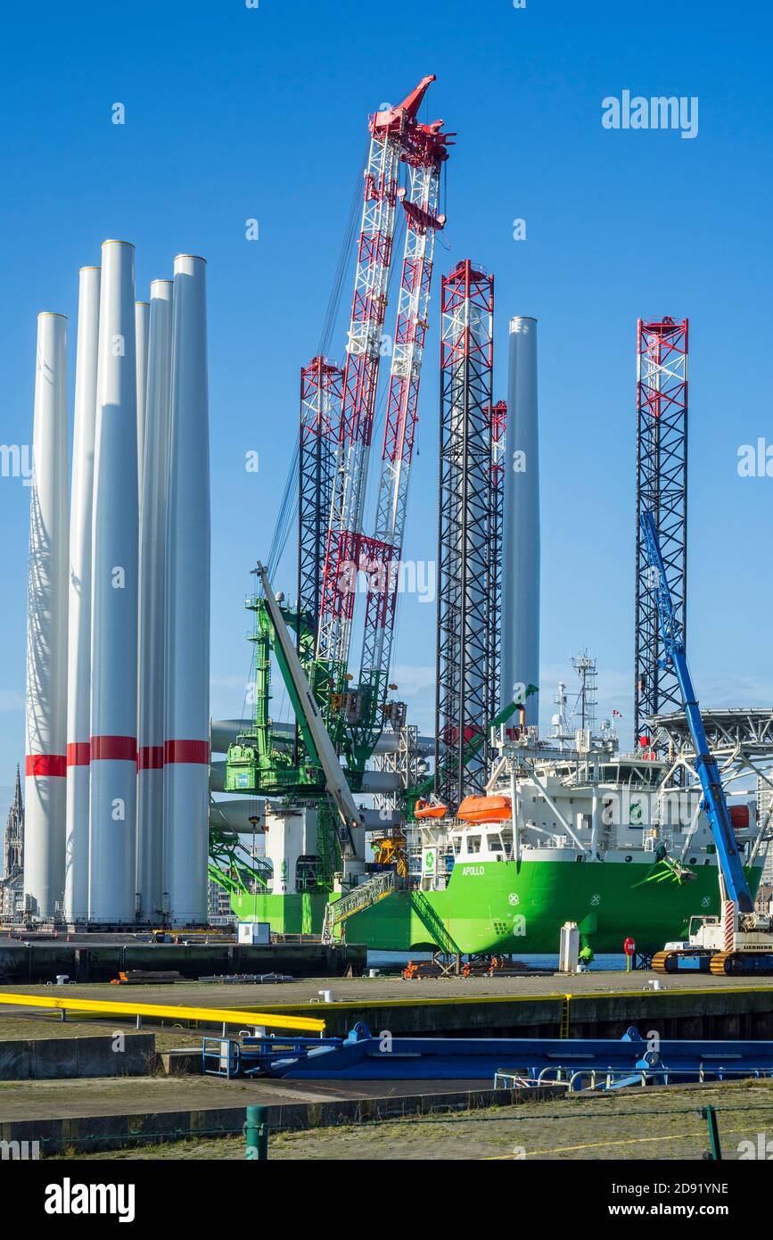 Installation vessel Apollo moored at REBO heavy load terminal in Ostend port, Belgium loading 2 sets of wind turbines for offshore SeaMade wind farm Stock Photo