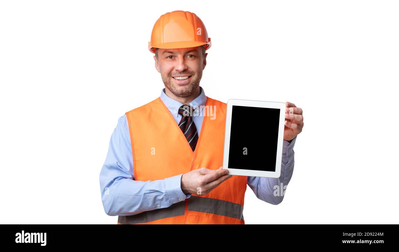 Construction Worker Showing Tablet Empty Screen Over White Background, Panorama Stock Photo