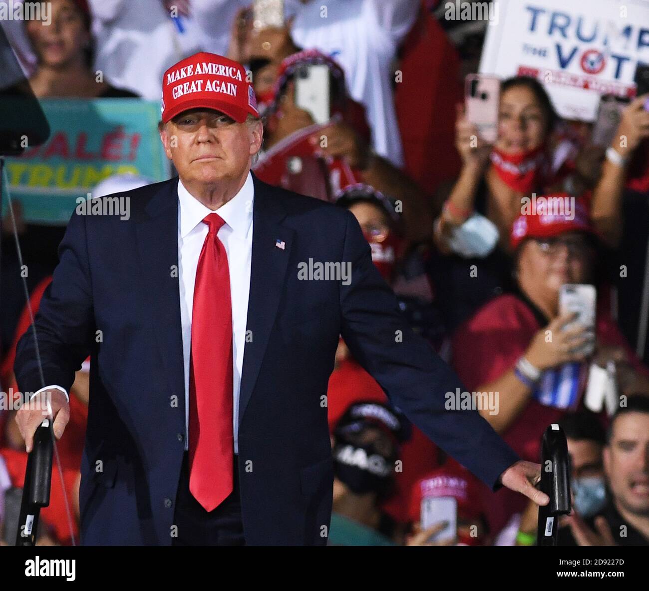 Opa Locka, United States. 01st Nov, 2020. November 1, 2020 - Opa-Locka, Florida, United States - U.S. President Donald Trump takes the stage to speak at a campaign rally at Miami-Opa Locka Executive Airport on November 1, 2020 in Opa-Locka, Florida. President Trump held events in five states today, as he continues his campaign against Democratic presidential nominee Joe Biden two days before the November 3 election. Credit: Paul Hennessy/Alamy Live News Stock Photo