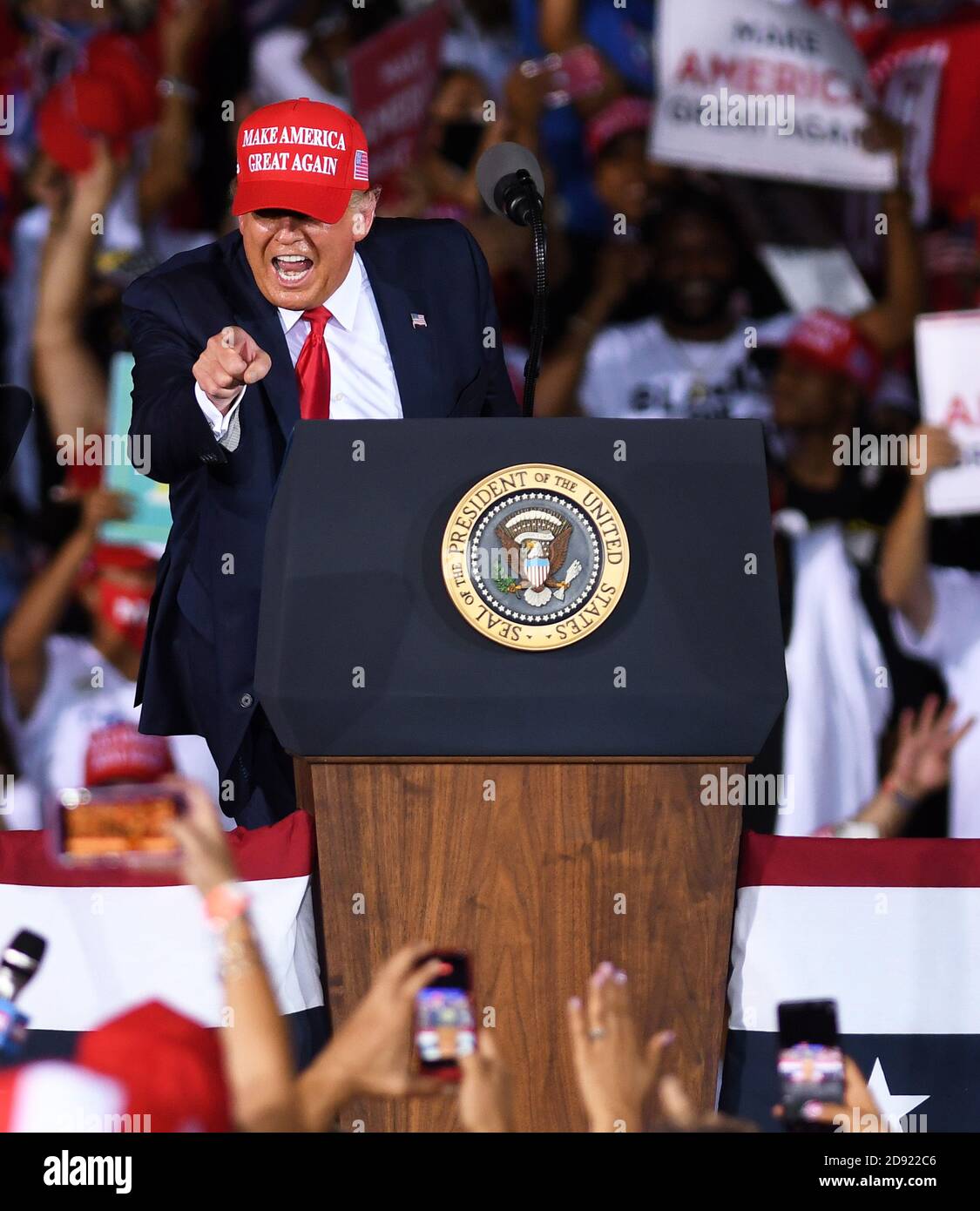 Opa Locka, United States. 01st Nov, 2020. November 1, 2020 - Opa-Locka, Florida, United States - U.S. President Donald Trump gestures as he speaks at a campaign rally at Miami-Opa Locka Executive Airport on November 1, 2020 in Opa-Locka, Florida. President Trump held events in five states today, as he continues his campaign against Democratic presidential nominee Joe Biden two days before the November 3 election. Credit: Paul Hennessy/Alamy Live News Stock Photo