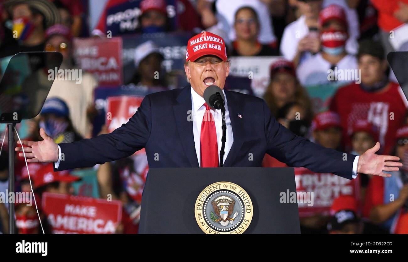 Opa Locka, United States. 01st Nov, 2020. November 1, 2020 - Opa-Locka, Florida, United States - U.S. President Donald Trump gestures as he speaks at a campaign rally at Miami-Opa Locka Executive Airport on November 1, 2020 in Opa-Locka, Florida. President Trump held events in five states today, as he continues his campaign against Democratic presidential nominee Joe Biden two days before the November 3 election. Credit: Paul Hennessy/Alamy Live News Stock Photo