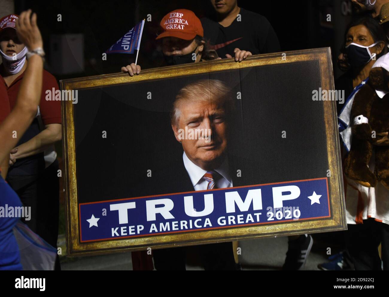 Opa Locka, United States. 01st Nov, 2020. November 1, 2020 - Opa-Locka, Florida, United States - People wait in line to hear U.S. President Donald Trump speak at a campaign rally at Miami-Opa Locka Executive Airport on November 1, 2020 in Opa-Locka, Florida. President Trump held events in five states today, as he continues his campaign against Democratic presidential nominee Joe Biden two days before the November 3 election. Credit: Paul Hennessy/Alamy Live News Stock Photo