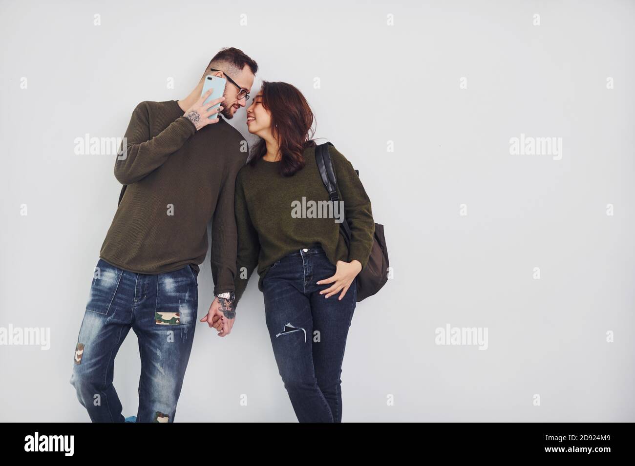 Relaxed Japanese Couple Chilling Together at Home, Using Gadgets Stock  Image - Image of married, cheerful: 249408669