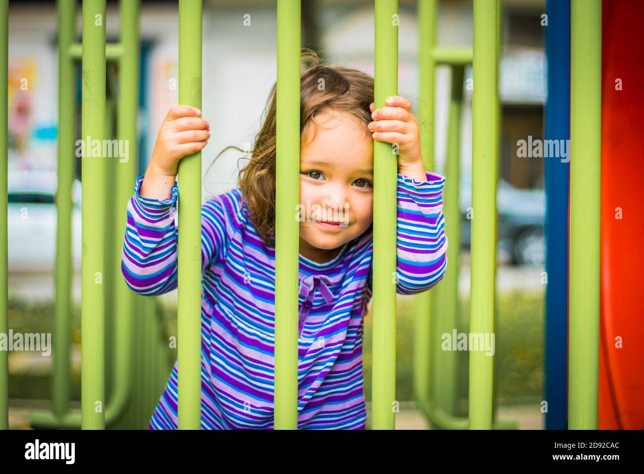 Adorable child smiling and playing in the playground Stock Photo - Alamy