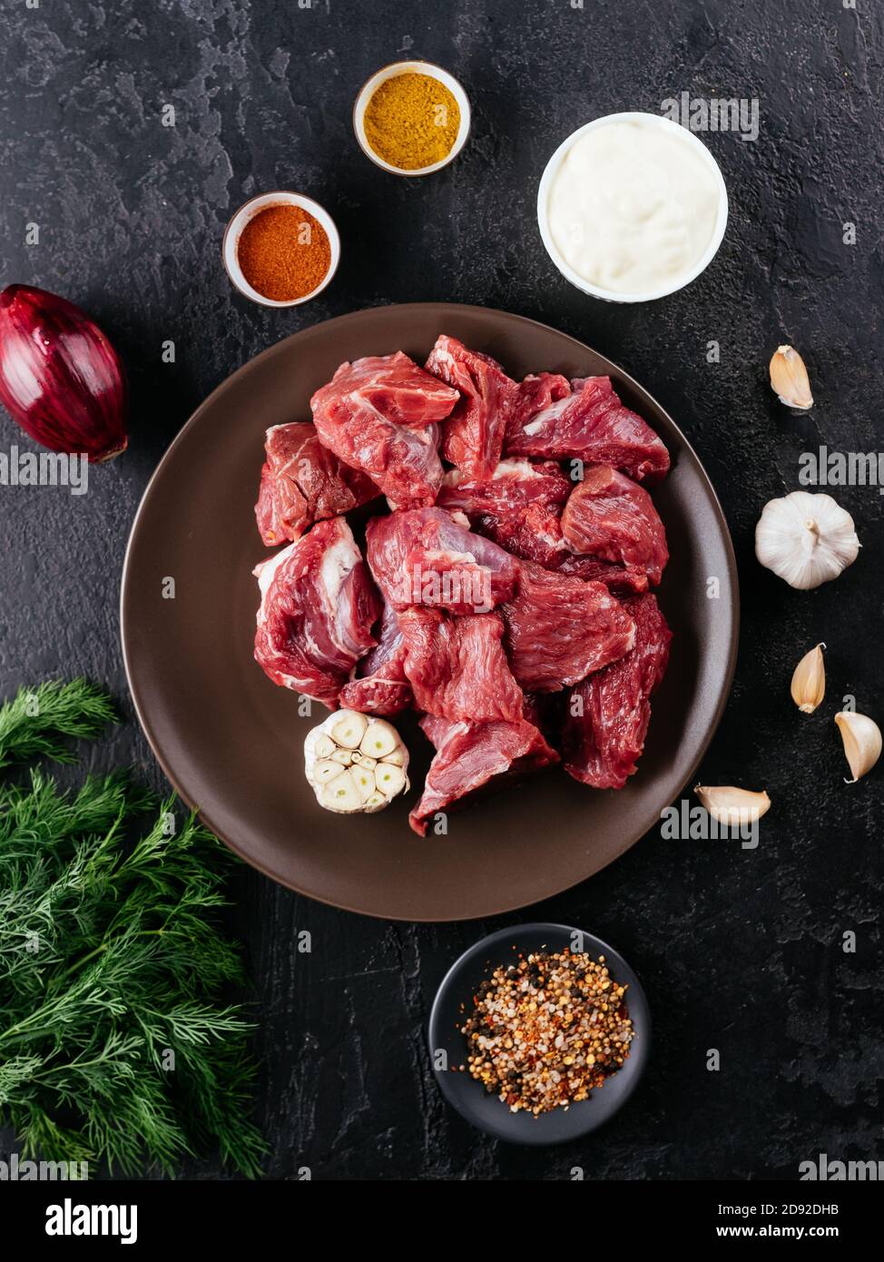 fresh pork meat with spices and vegetables Stock Photo Alamy