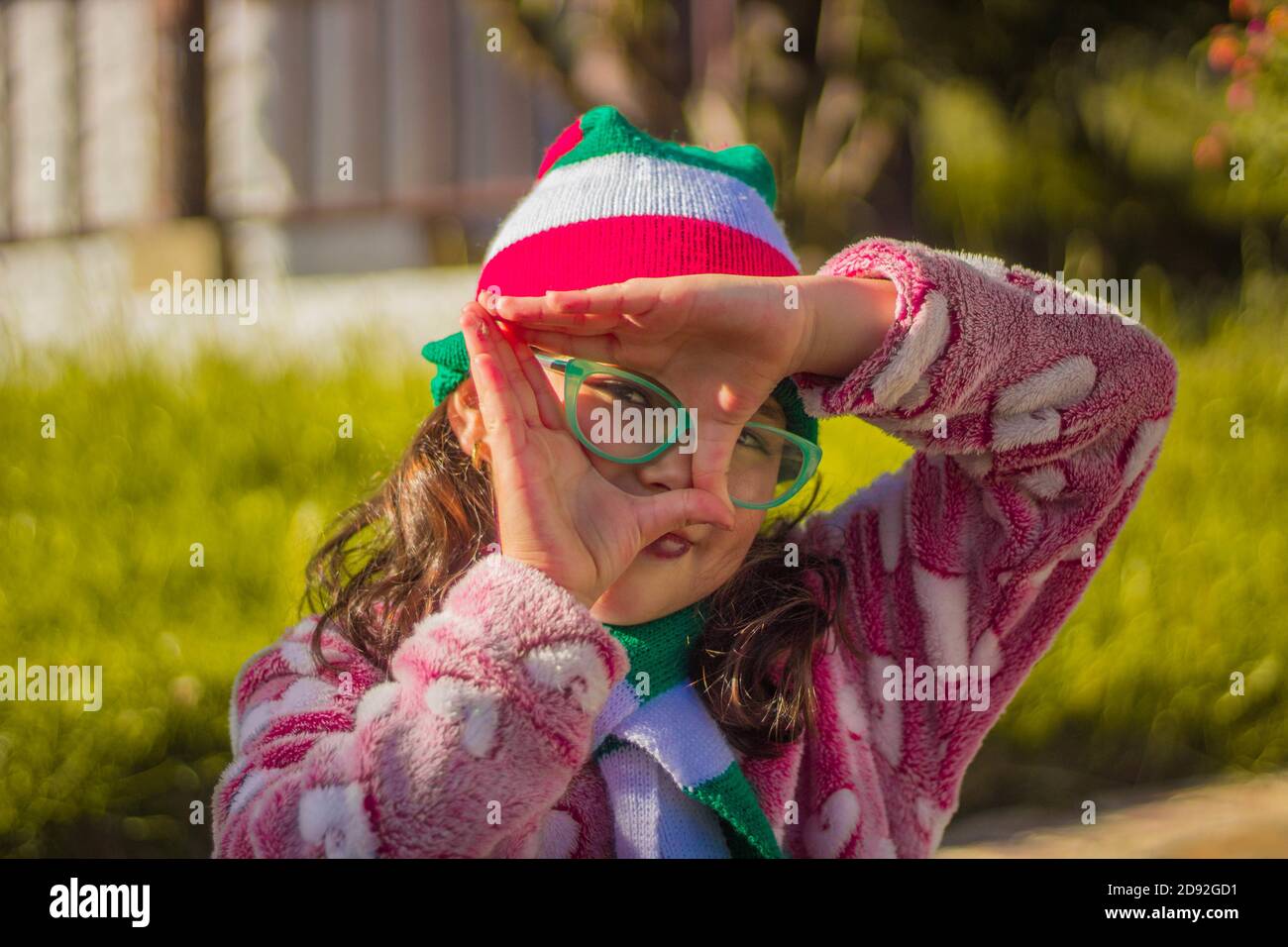 Adorable girl smiling and looking at the camera Stock Photo - Alamy