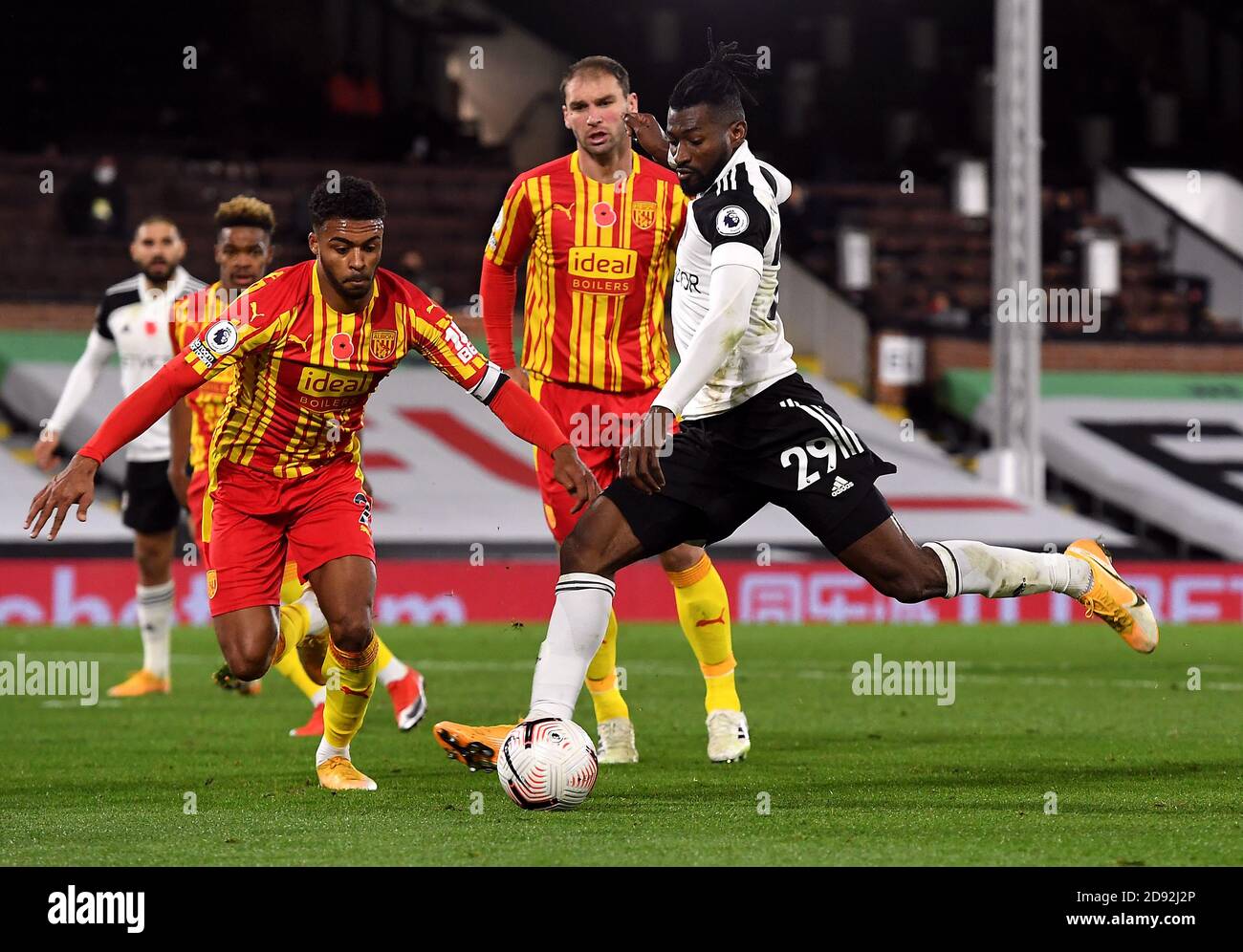 Fulham S Andre Frank Zambo Anguissa Has A Shot At Goal During The Premier League Match At Craven Cottage London Stock Photo Alamy