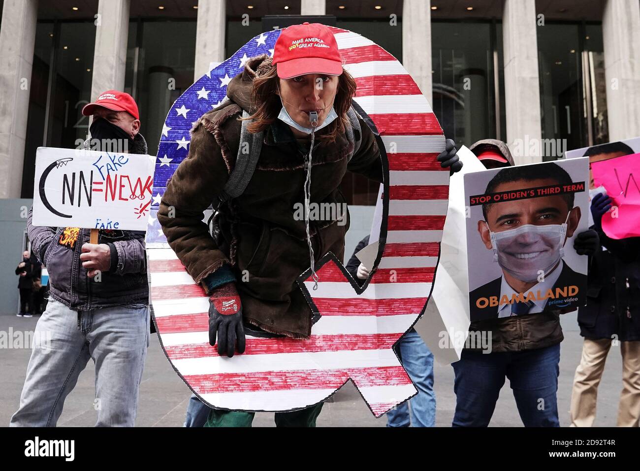 Qanon activists rally to show their support for Fox News outside their headquarters in the Manhattan borough of New York City, New York, U.S., November 2, 2020. REUTERS/Carlo Allegri Stock Photo