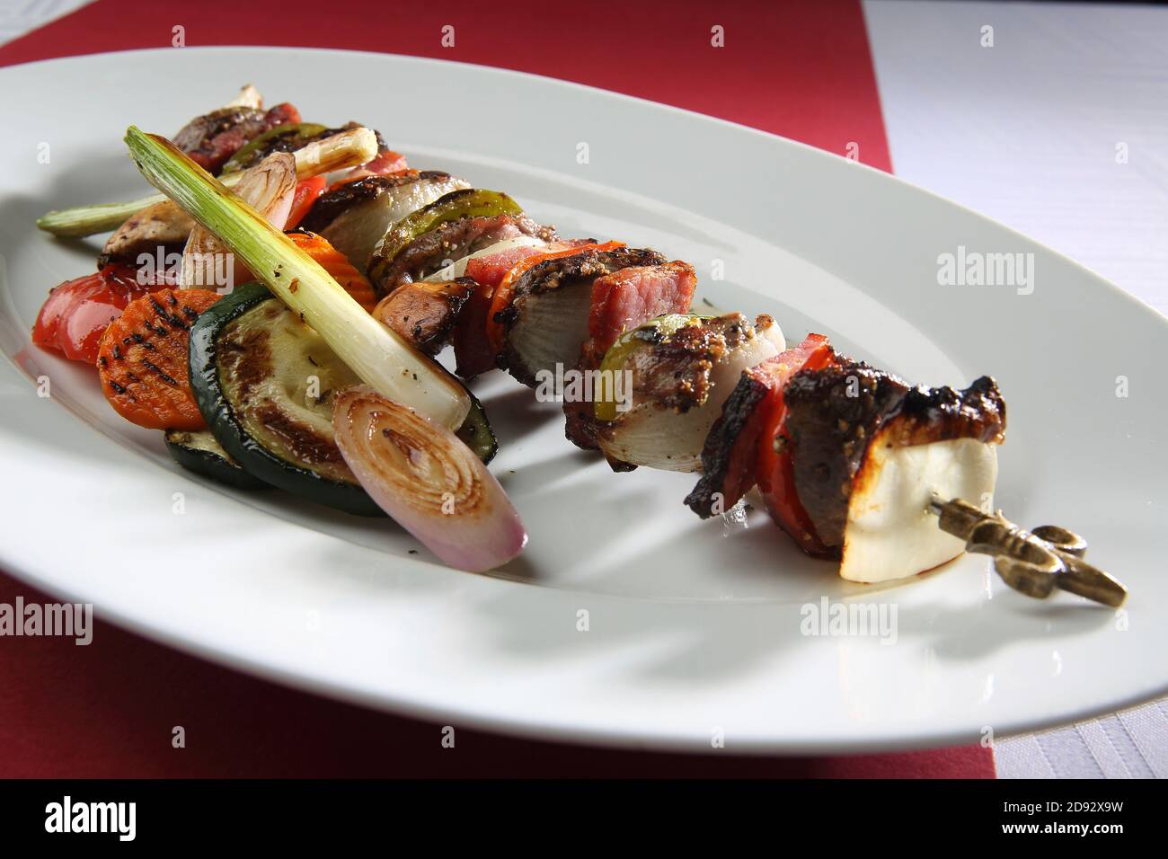 Pork skewers with roasted vegetables and Horseradish sauce. (CTK Photo ...