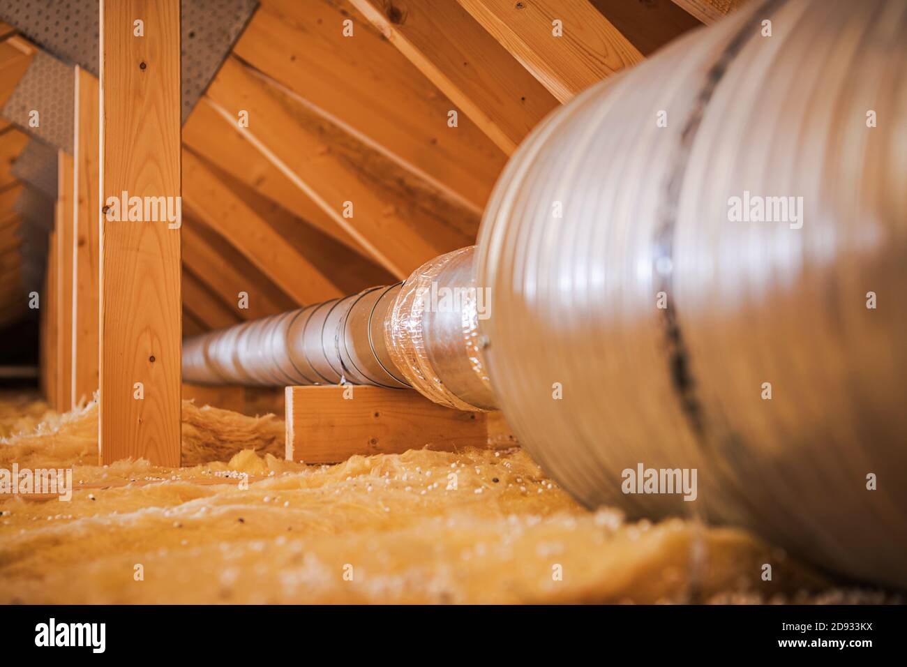 Attic Stainless Steel House Air Circulation Pipeline with Filter. HVAN Technologies Inside Modern Wooden Building. Stock Photo