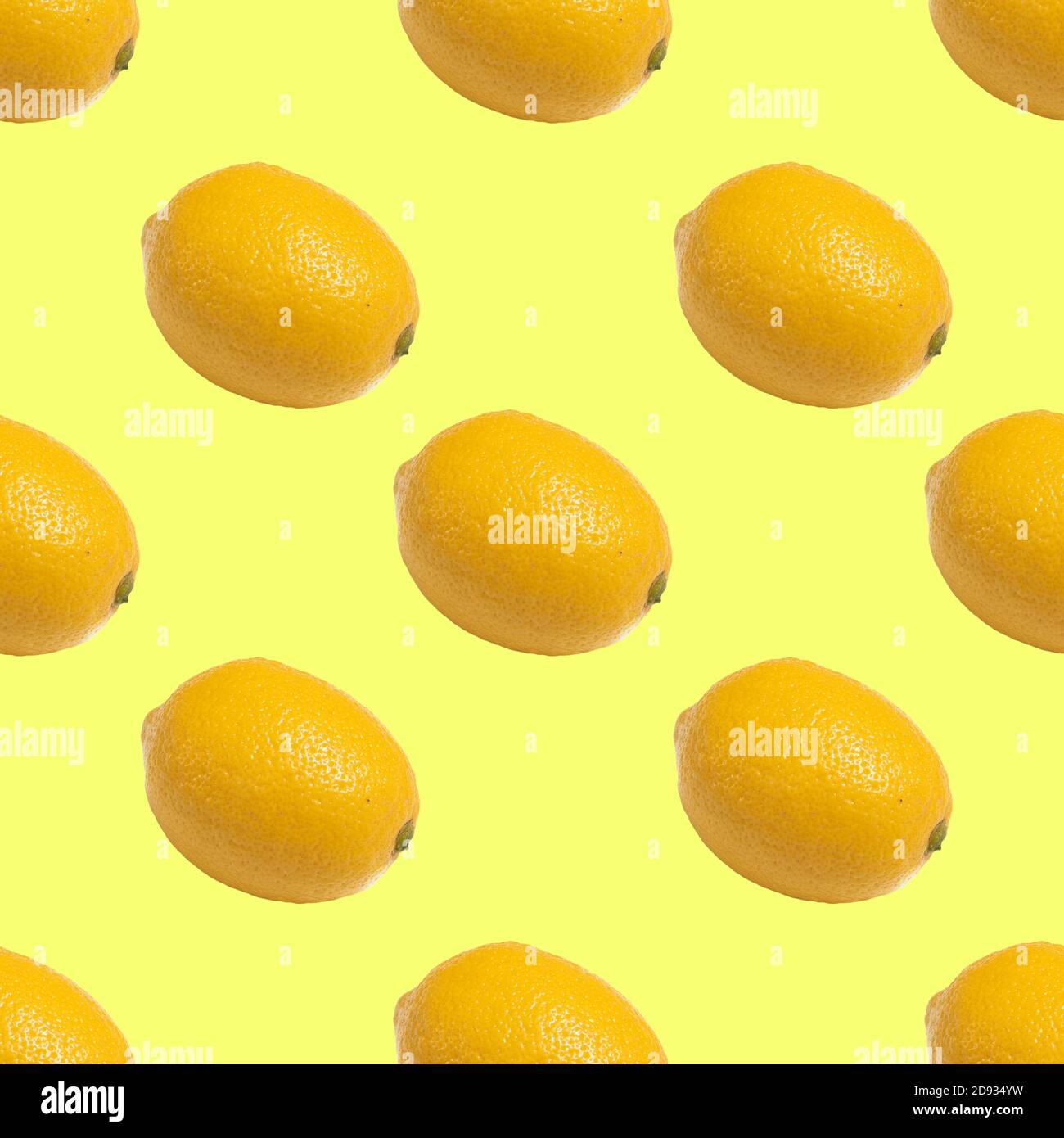 Seamless pattern with yellow lemons on yellow background Stock Photo