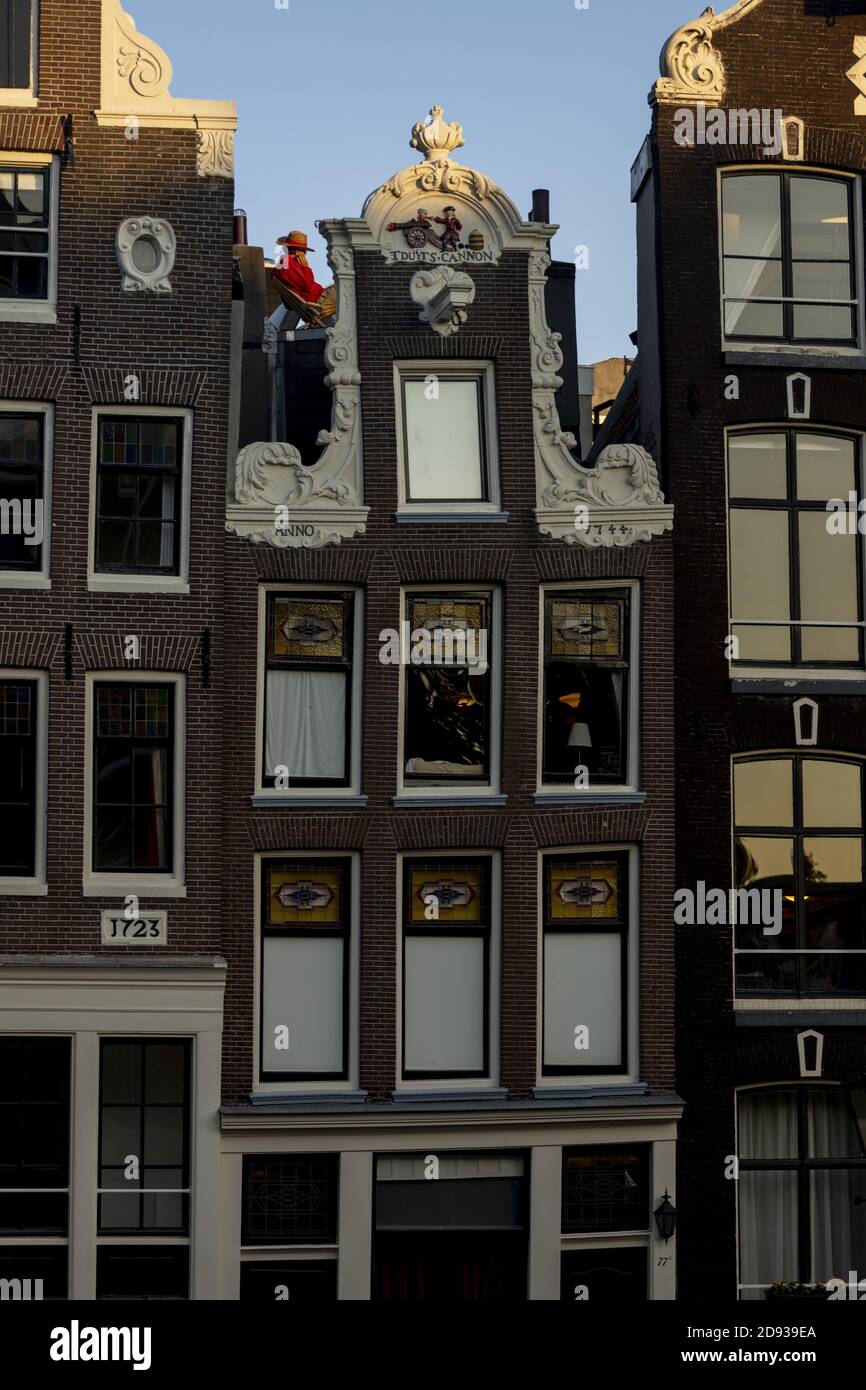 AMSTERDAM, NETHERLANDS - Sep 22, 2020: Facades of typical canal houses on Herengracht street in popular with tourists for the authentic historic archi Stock Photo