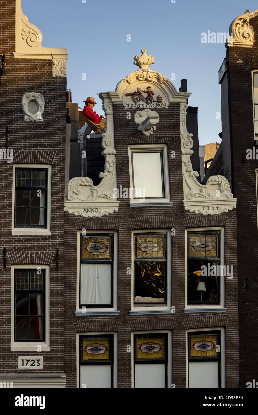 AMSTERDAM, NETHERLANDS - Sep 22, 2020: Facades of typical canal houses on Herengracht street in popular with tourists for the authentic historic archi Stock Photo