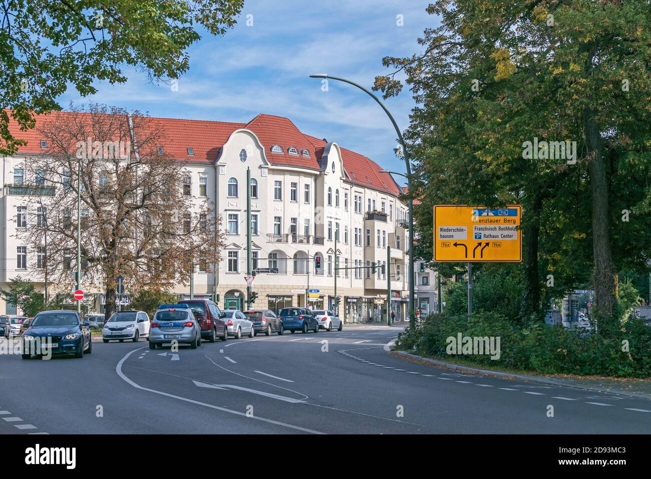 Berlin, Germany - October 3, 2020: Very busy road Wolankstrasse and the typical for the district of Pankow old town house, Wilhelminian style building Stock Photo