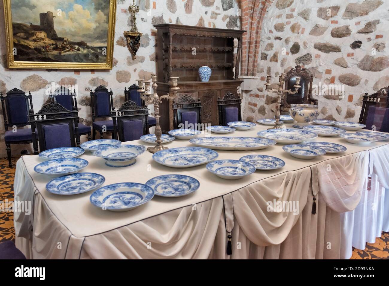 Dining table with plates in Trakai Island Castle, Lithuania Stock Photo