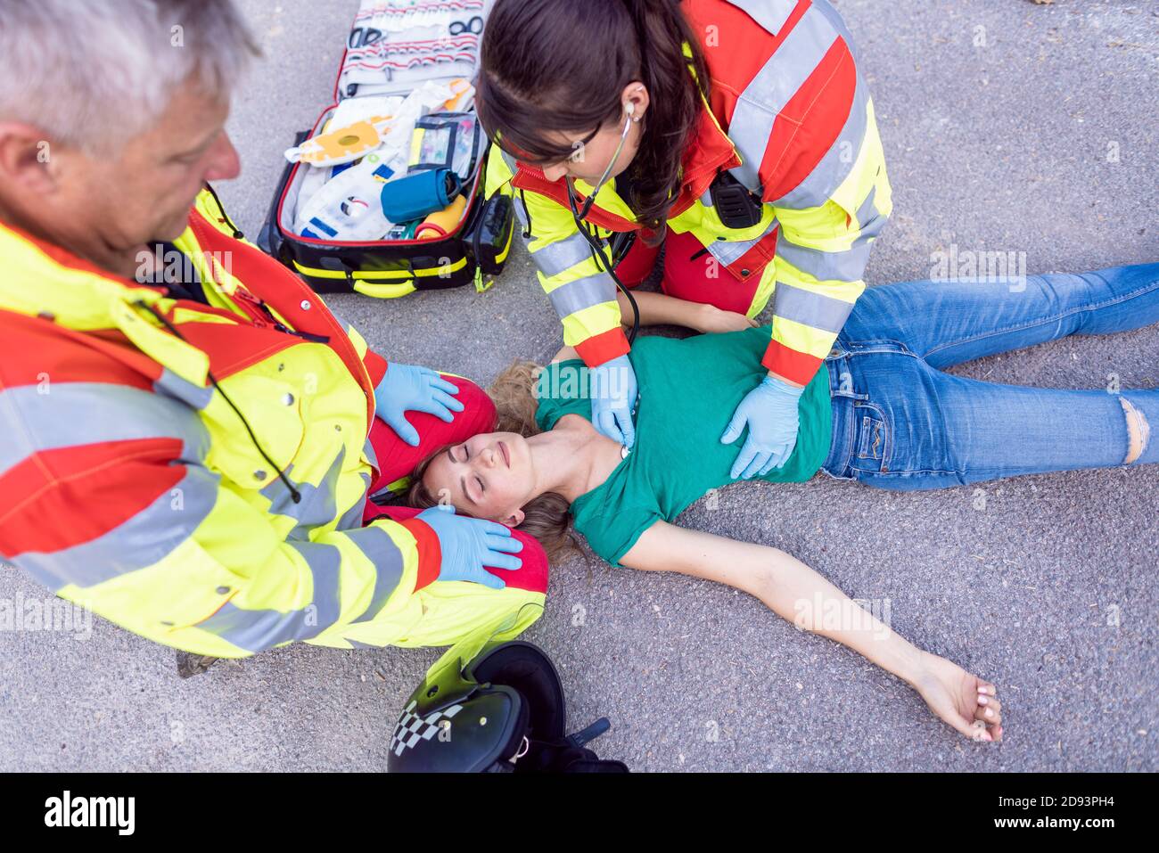Paramedic and emergency doctor at site of traffic accident Stock Photo Alamy