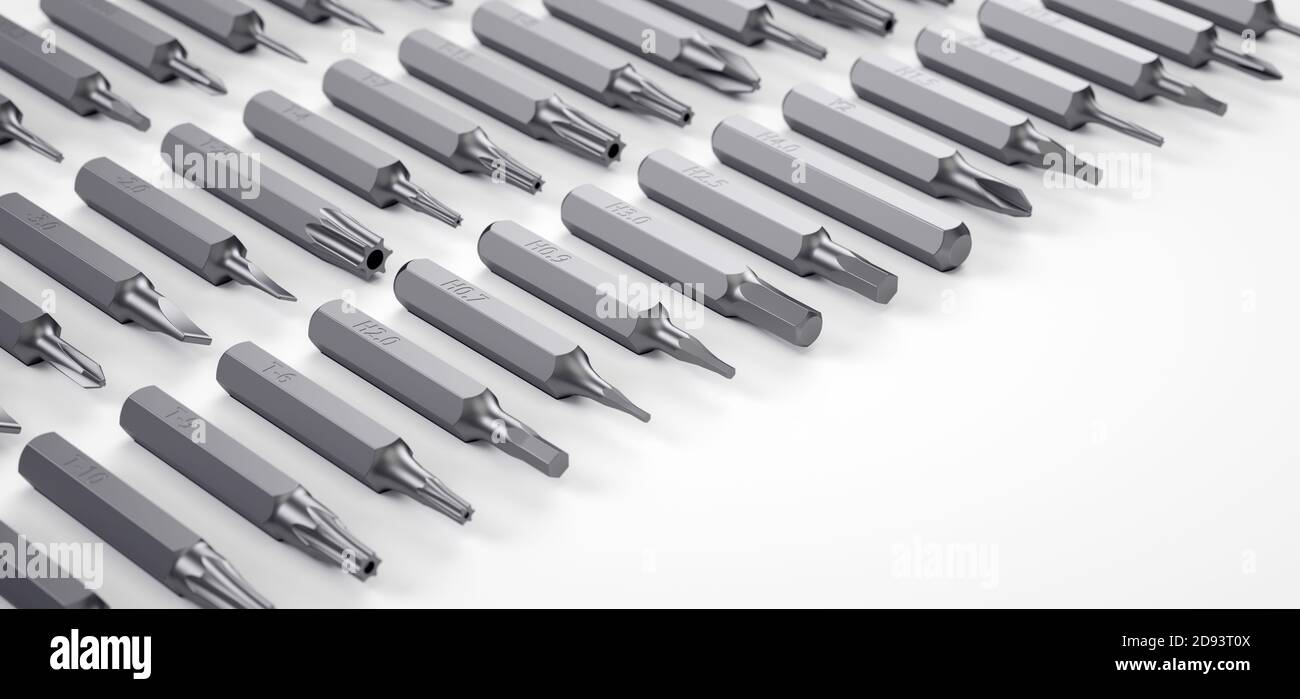 Set of screwdriver bits on white background. Stock Photo