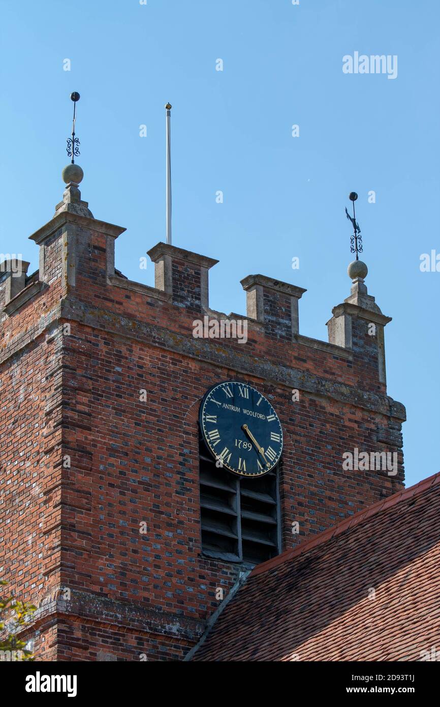 Clock tower of St James the Less, Pangbourne.  Kenneth Grahame the author of Wind in the Willows, lived in the adjacent Church Cottage. Stock Photo