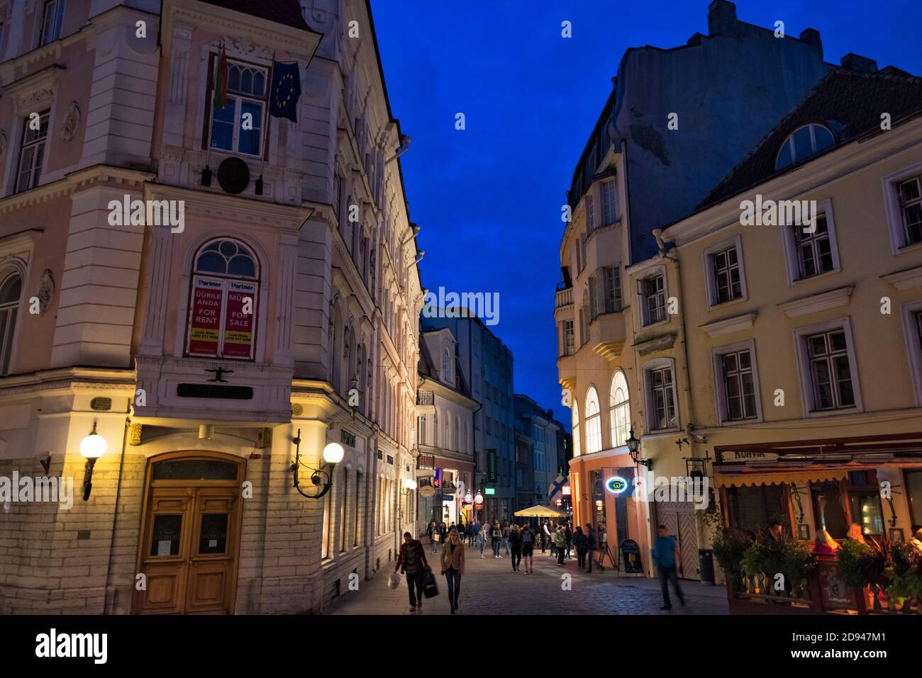 Night view of historic buildings in Tallinn Town Hall Square, Estonia Stock Photo