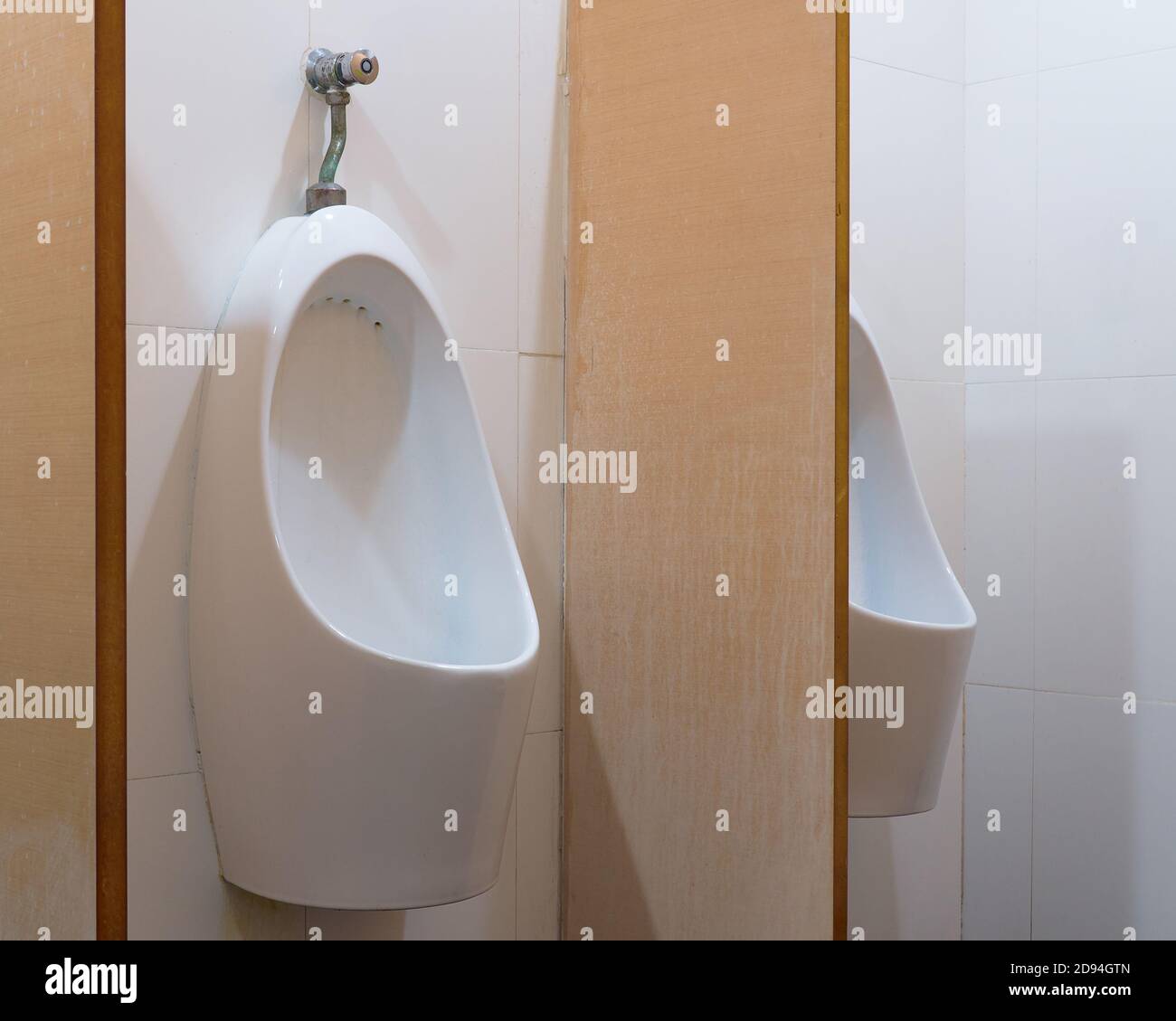 Closeup shot of wallmounted urinal Stock Photo Alamy