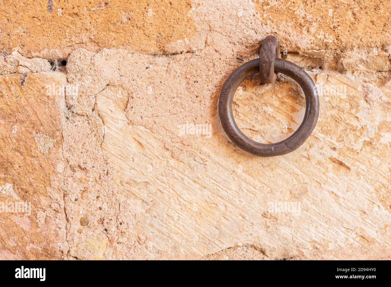 metal hook on stone wall Stock Photo