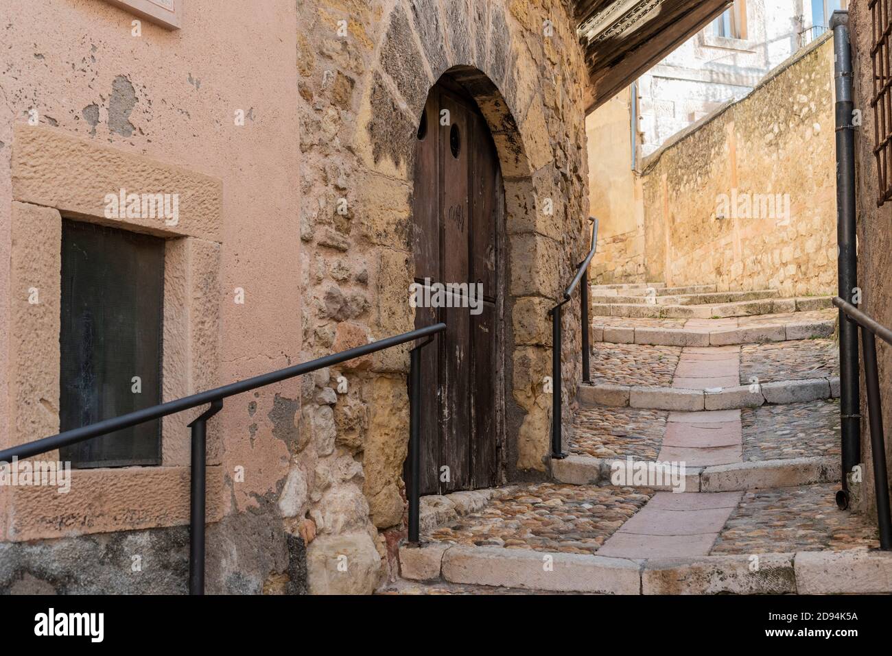 stairs medieval village and wooden door Stock Photo