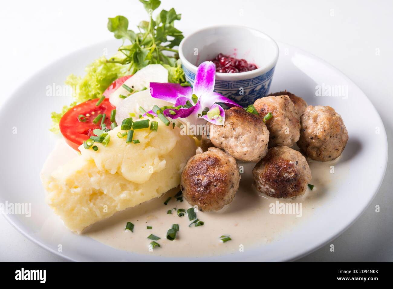 Swedish meatballs with mash potato and lingonberry sauce Stock Photo