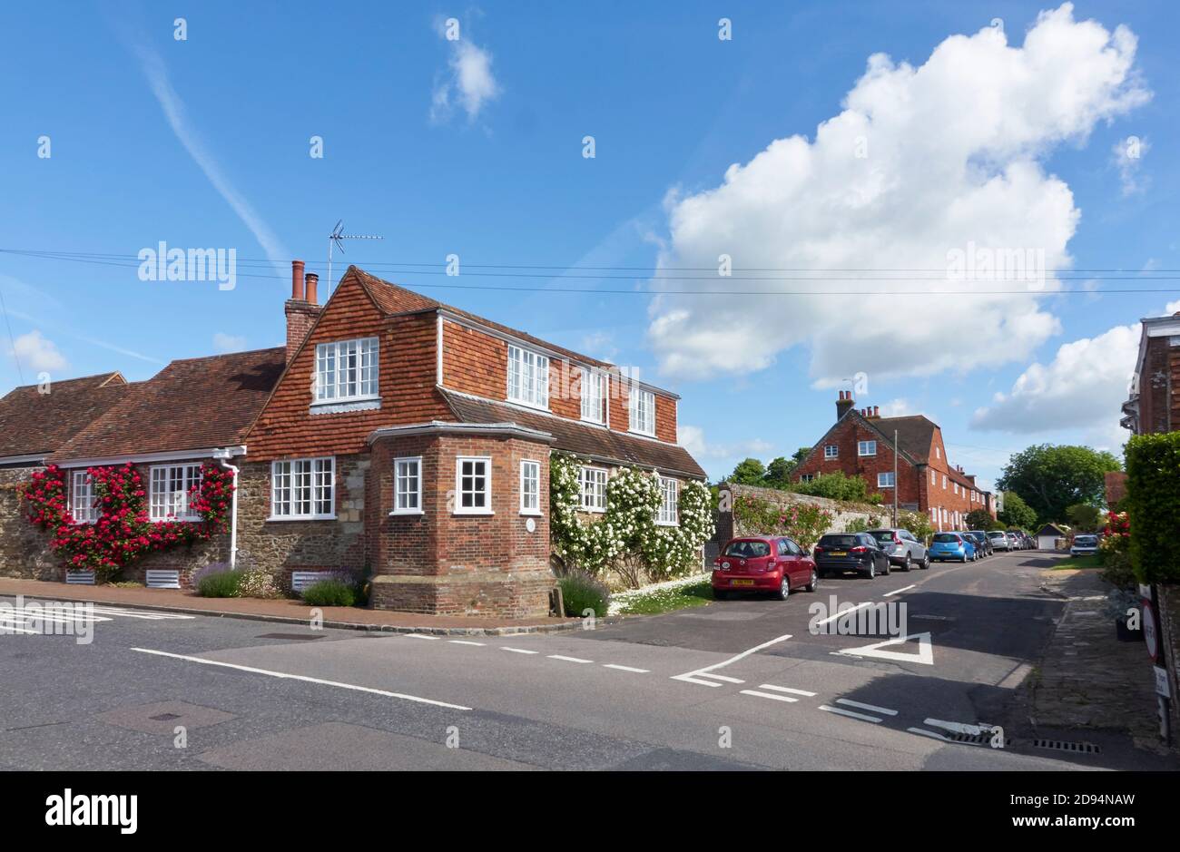 Rose covered houses in Winchelsea, East Sussex, UK Stock Photo