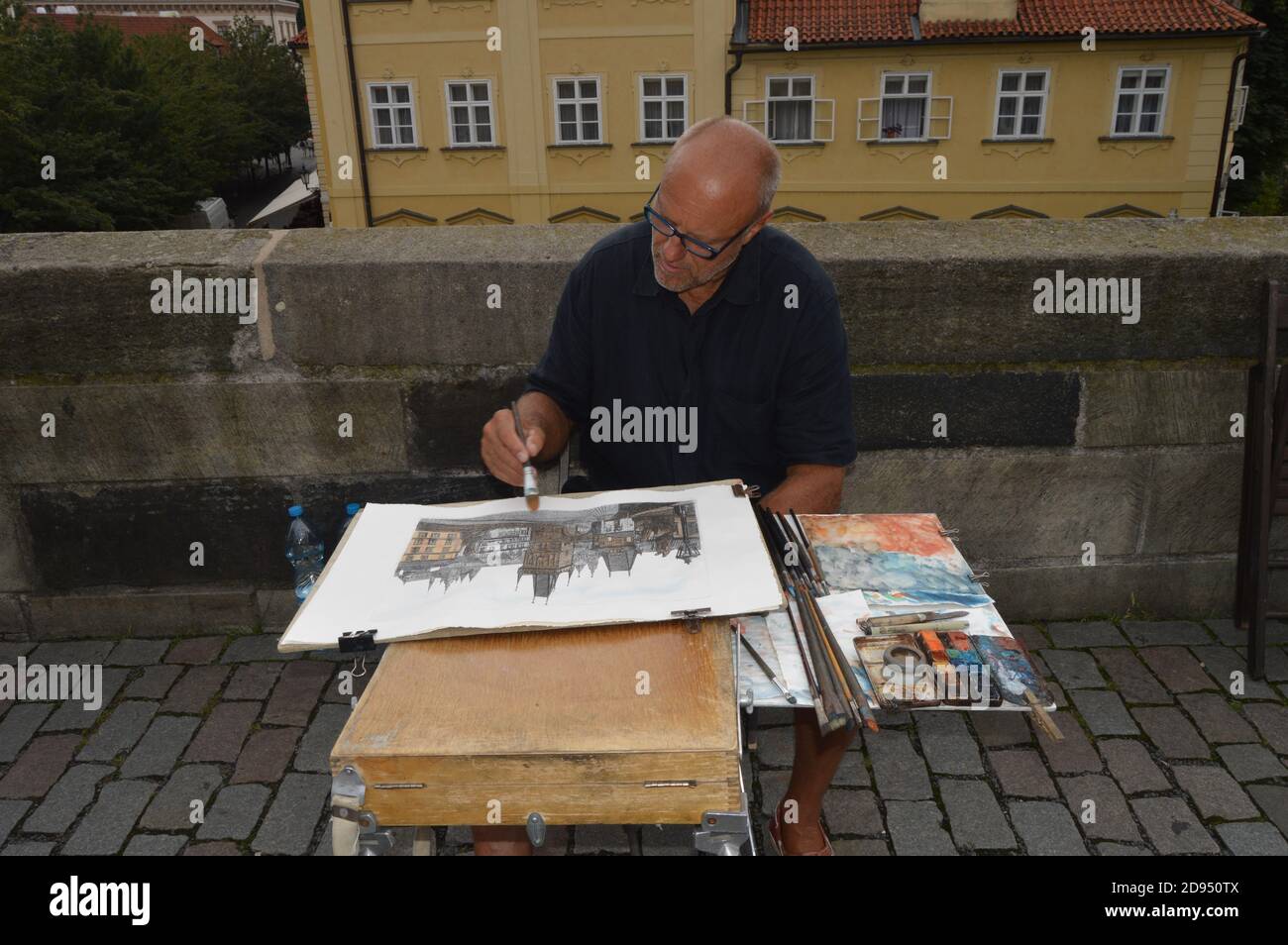 AMBERES, BELGIUM - Jul 29, 2016: An artist painting in the streets of Amberes Belgium Stock Photo