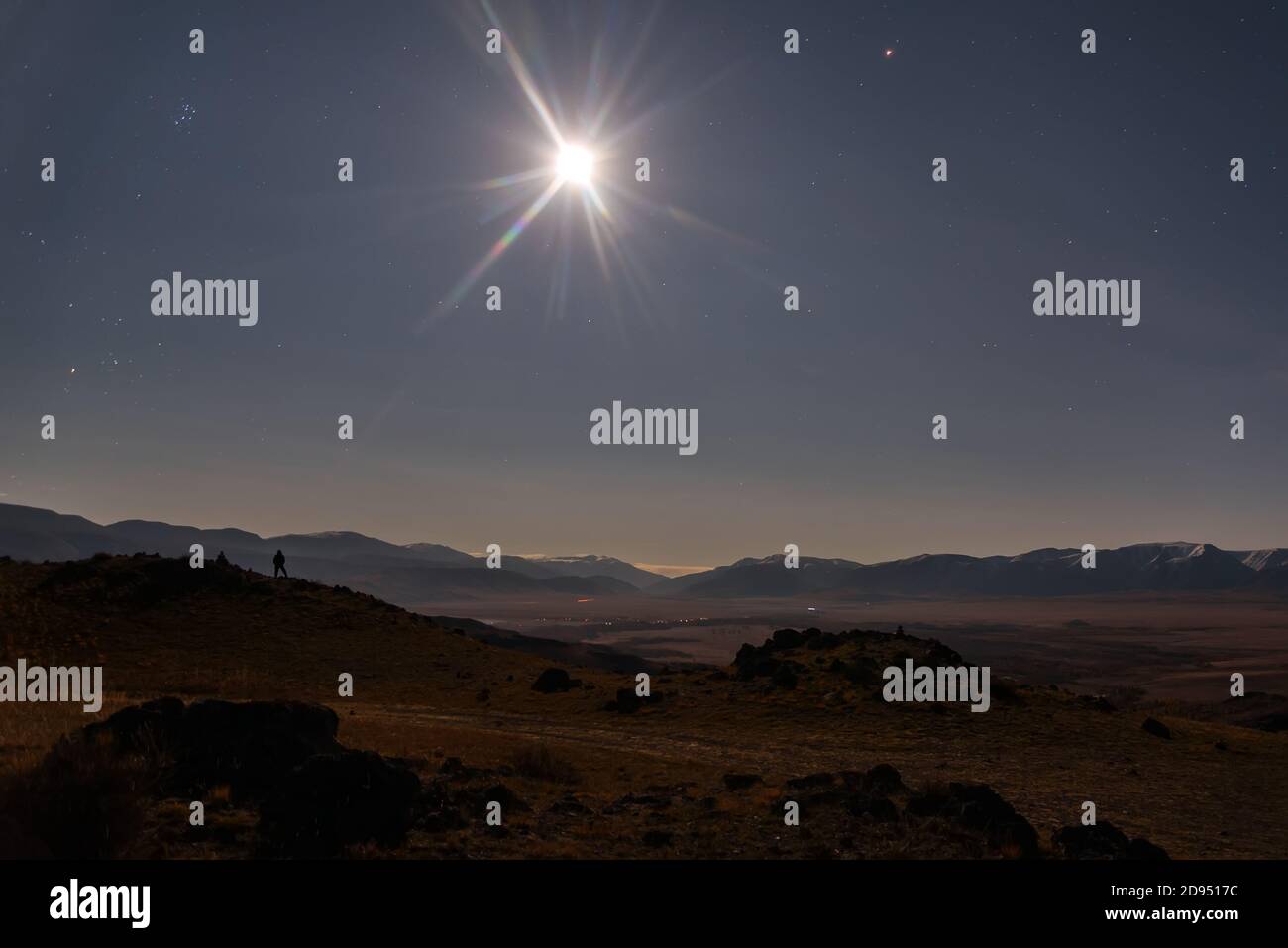 Colorful night landscape with bright moon and stars in the night sky ...