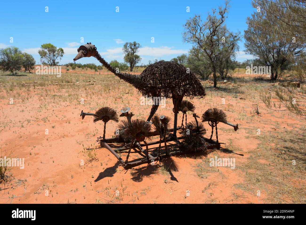 Metal Daddy Emu and Chicks sculpture by Outback artist Milynda Rogers, Windorah, a sleepy remote Outback town, Queensland, QLD, Australia Stock Photo