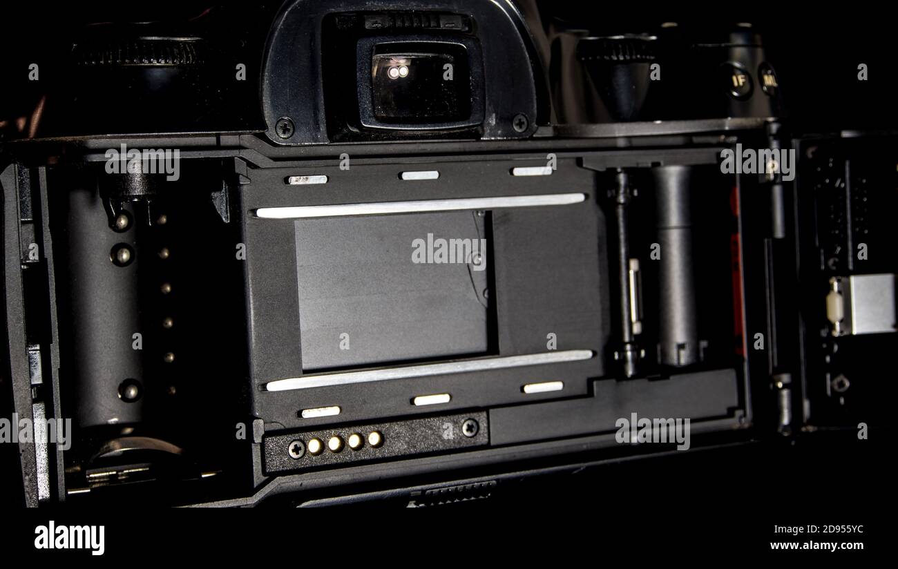 Back view of film system SLR camera body opened back lid to film