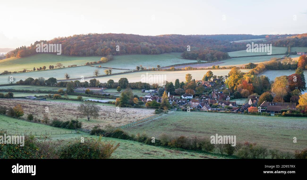 Early autumn morning at sunrise looking over Turville village in the chiltern hills. Turville, Buckinghamshire, England Stock Photo