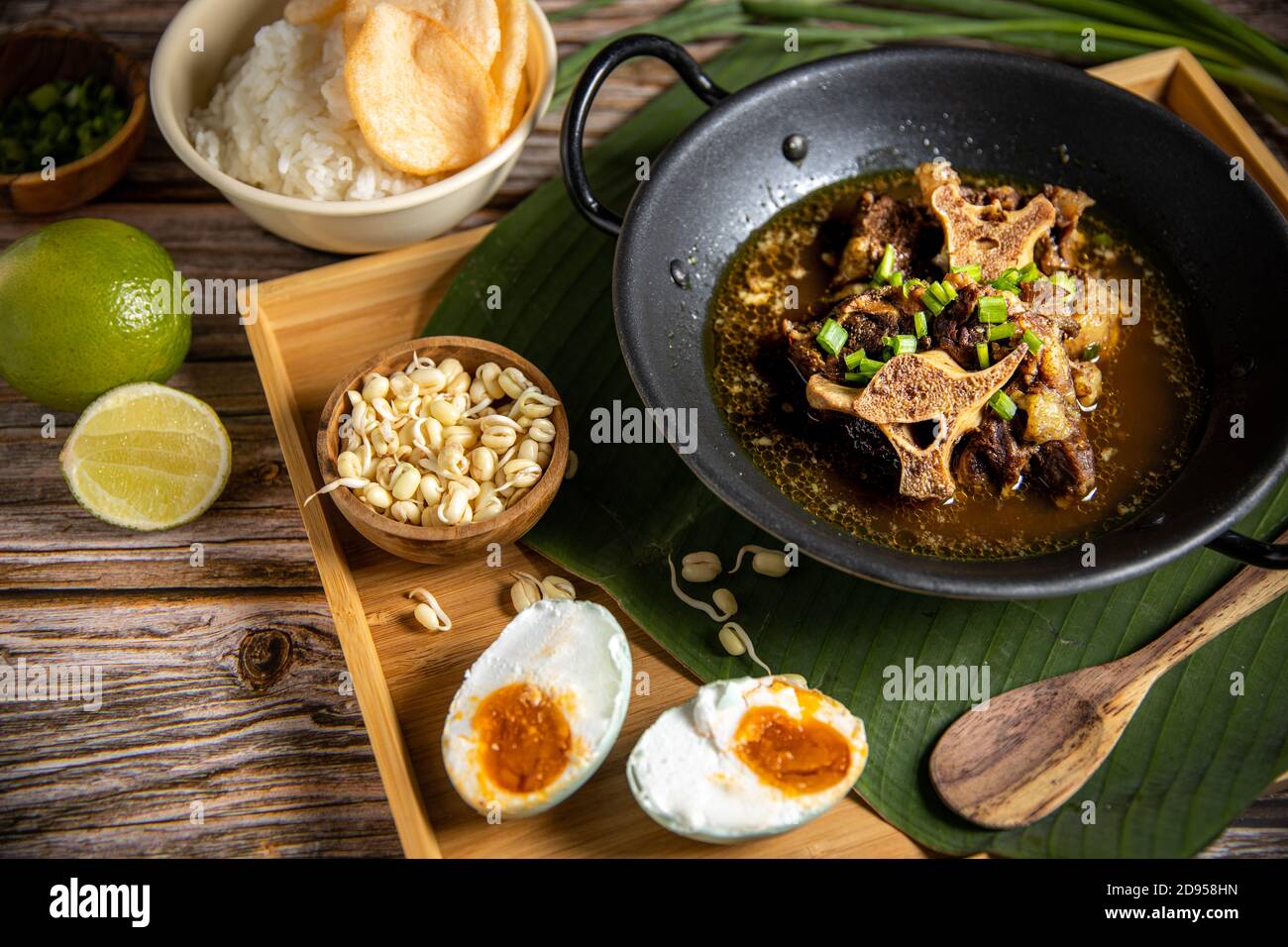 Oxtail Soup or Sop Buntut. Indonesian own Beef Stew Traditional Food Stock Photo