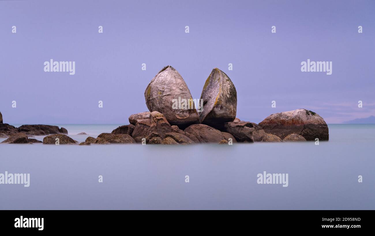 Long exposure image of Split Apple Rock in Tasman Bay off the northern coast of the South Island of New Zealand Stock Photo