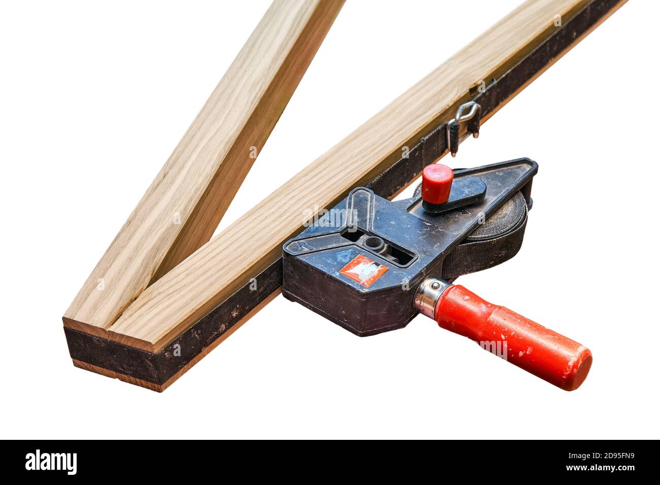 Joinery. Gluing and clamping wooden table leg on white background
