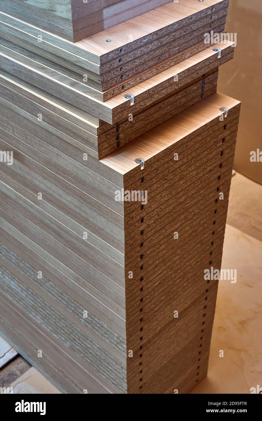 Stacked shelves. Veneer chipboard shelves with integrated shelf