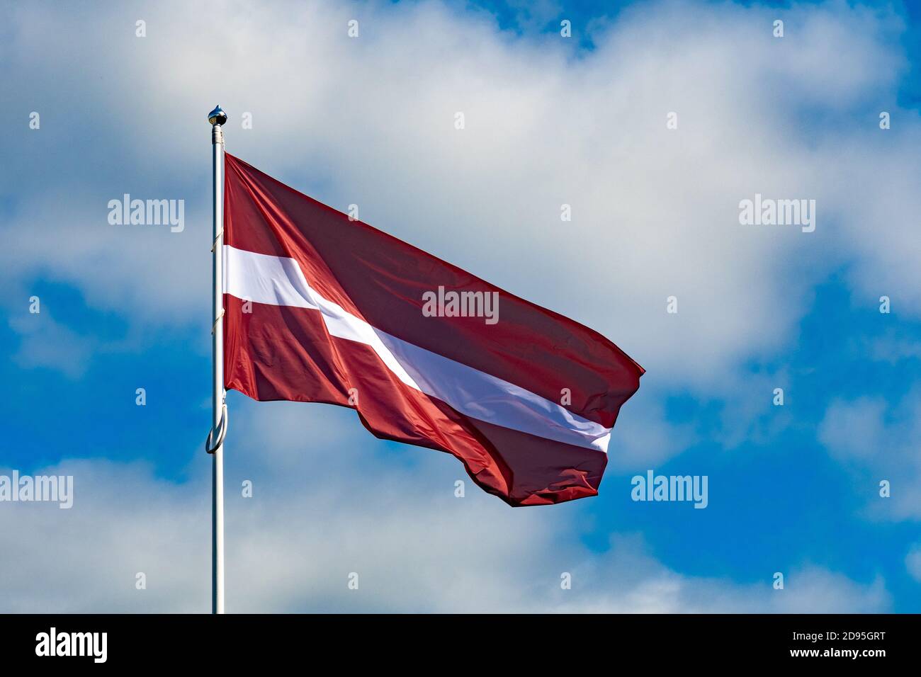 Latvian flag waving in the sky, Baltic countries, united, independent, borders, Baltic bubble Stock Photo