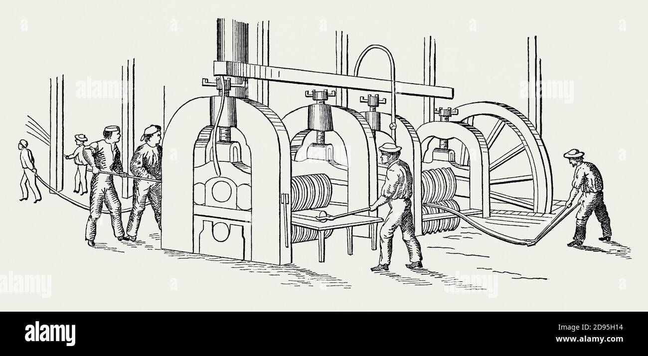 An old engraving showing workers drawing out the hot metal into long bars in a rolling mill or ‘ball chain’ in an iron works or foundry in the 1800s. It is from a Victorian mechanical engineering book of the 1880s. An ironworks or iron works is an industrial plant where iron is smelted and where heavy iron and steel products are made. An integrated ironworks in the 1800s usually included blast furnaces and a number of puddling furnaces or a foundry with or without other kinds of ironworks. Stock Photo
